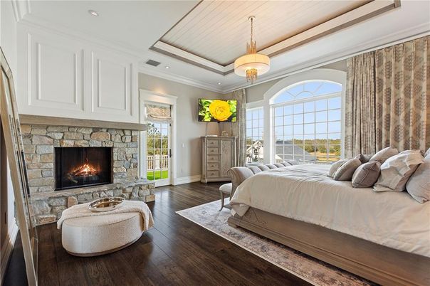 Bedroom, Fireplace, Interior, Pendant Lights, Recessed Lighting, Wood Texture Flooring