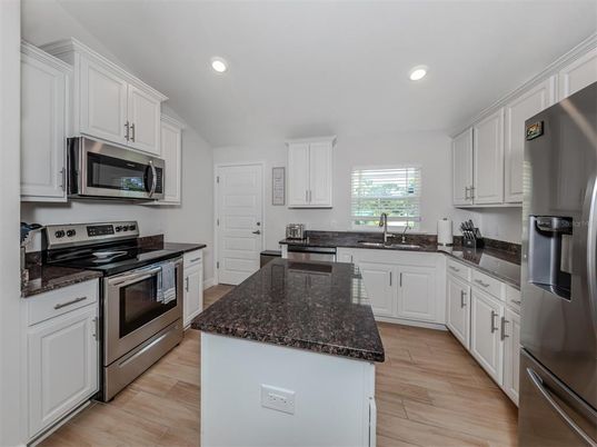 Interior, Kitchen, Recessed Lighting, Stainless Steel Appliances, Wood Texture Flooring