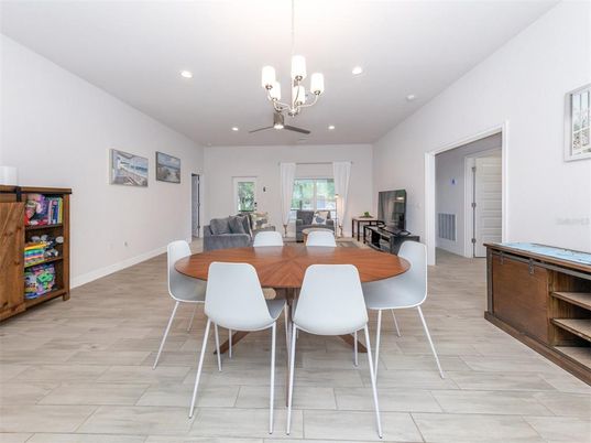 Chandelier, Dining room, Interior, Living room, Pendant Lights, Recessed Lighting, Wood Texture Flooring