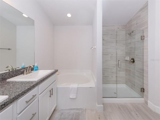Bathroom, Glass Shower, Interior, Recessed Lighting, Wood Texture Flooring