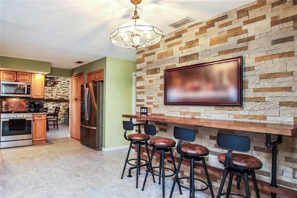 Chandelier, Interior, Kitchen, Pendant Lights, Stainless Steel Appliances, Stone Walls