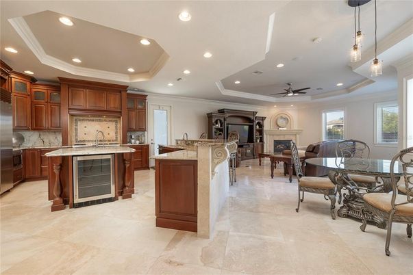 Dining room, Fireplace, Interior, Kitchen, Pendant Lights, Recessed Lighting, Stainless Steel Appliances