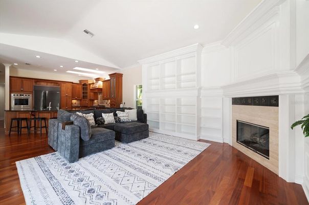 Fireplace, Interior, Kitchen, Living room, Recessed Lighting, Stainless Steel Appliances, Wood Texture Flooring