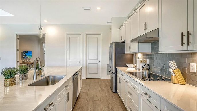 Interior, Kitchen, Pendant Lights, Recessed Lighting, Stainless Steel Appliances, Wood Texture Flooring