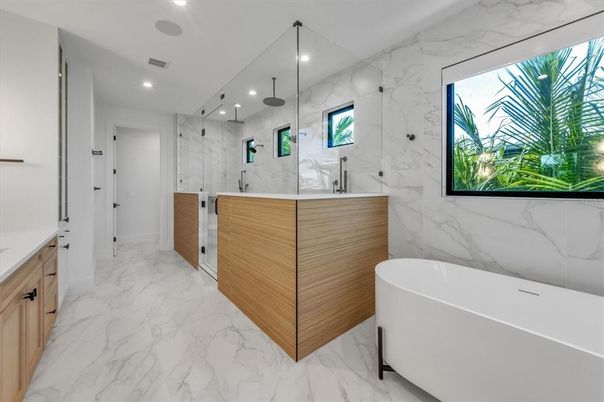 Bathroom, Dual Sink Vanities, Free Standing Baths, Glass Shower, Interior, Marble, Marble Walls, Recessed Lighting