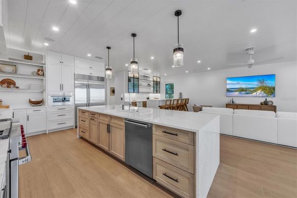 Dining room, Interior, Kitchen, Living room, Pendant Lights, Recessed Lighting, Stainless Steel Appliances, Wood Texture Flooring
