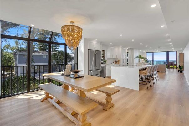 Chandelier, Dining room, Interior, Kitchen, Recessed Lighting, Stainless Steel Appliances, Wood Texture Flooring