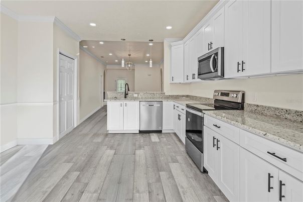Interior, Kitchen, Pendant Lights, Recessed Lighting, Stainless Steel Appliances, Wood Texture Flooring