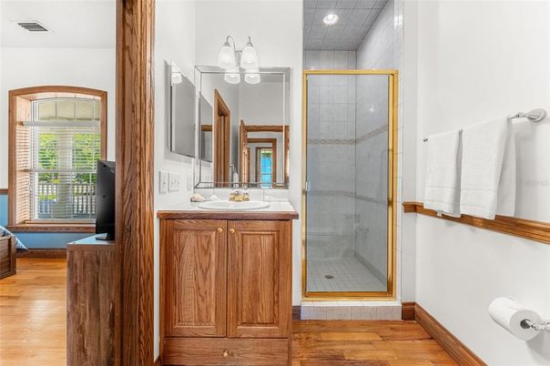 Bathroom, Glass Shower, Interior, Recessed Lighting, Wood Texture Flooring