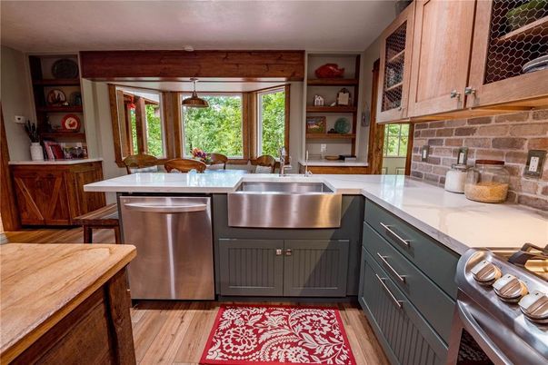 Dining room, Interior, Kitchen, Pendant Lights, Stainless Steel Appliances, Wood Texture Flooring