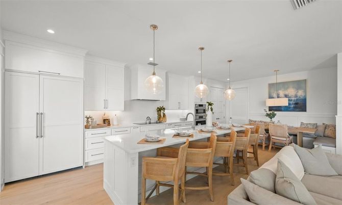 Dining room, Interior, Kitchen, Pendant Lights, Recessed Lighting, Stainless Steel Appliances, Wood Texture Flooring