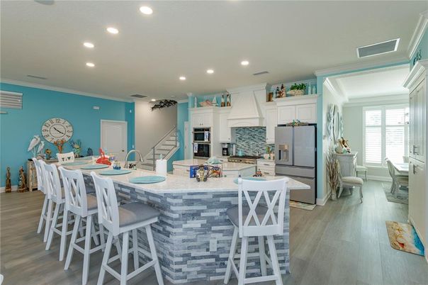 Dining room, Interior, Kitchen, Recessed Lighting, Stainless Steel Appliances, Wood Texture Flooring