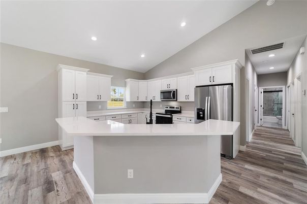Interior, Kitchen, Recessed Lighting, Stainless Steel Appliances, Wood Texture Flooring