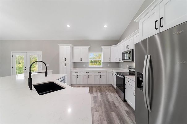 Interior, Kitchen, Recessed Lighting, Stainless Steel Appliances, Wood Texture Flooring