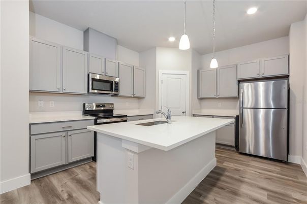 Interior, Kitchen, Pendant Lights, Recessed Lighting, Stainless Steel Appliances, Wood Texture Flooring