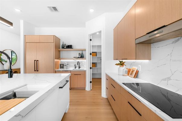 Interior, Kitchen, Marble Walls, Recessed Lighting, Wood Texture Flooring