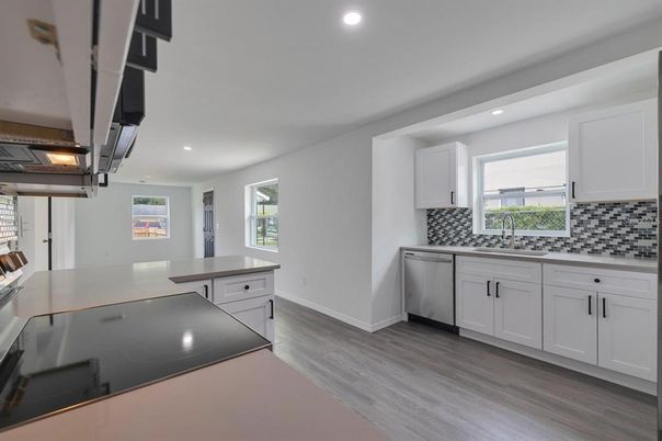 Interior, Kitchen, Recessed Lighting, Stainless Steel Appliances, Wood Texture Flooring