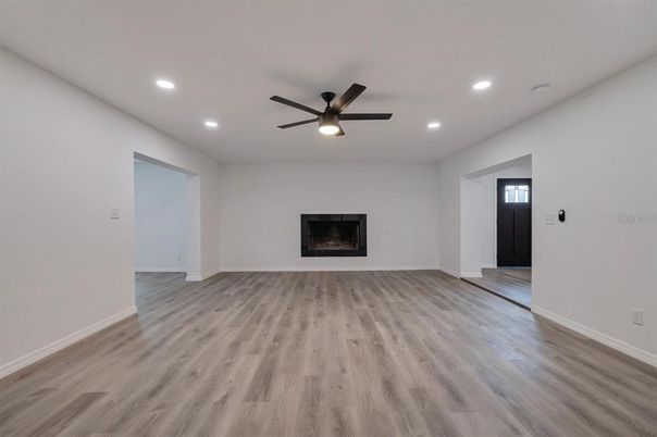 Empty room, Fireplace, Interior, Recessed Lighting, Wood Texture Flooring