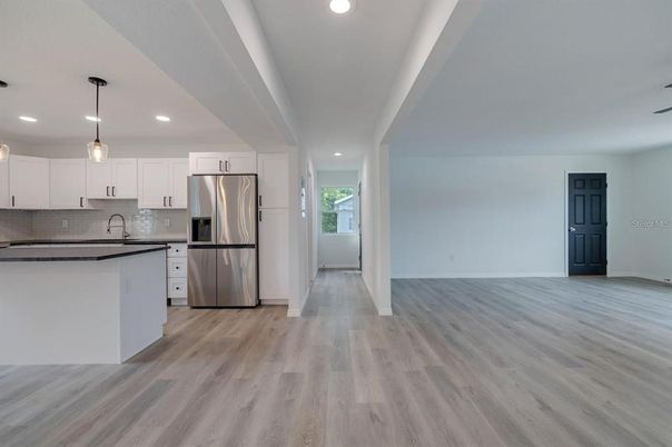 Interior, Kitchen, Pendant Lights, Recessed Lighting, Stainless Steel Appliances, Wood Texture Flooring
