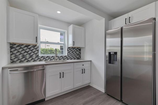 Interior, Kitchen, Recessed Lighting, Stainless Steel Appliances, Wood Texture Flooring