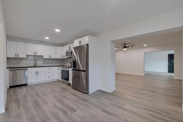 Interior, Kitchen, Recessed Lighting, Stainless Steel Appliances, Wood Texture Flooring