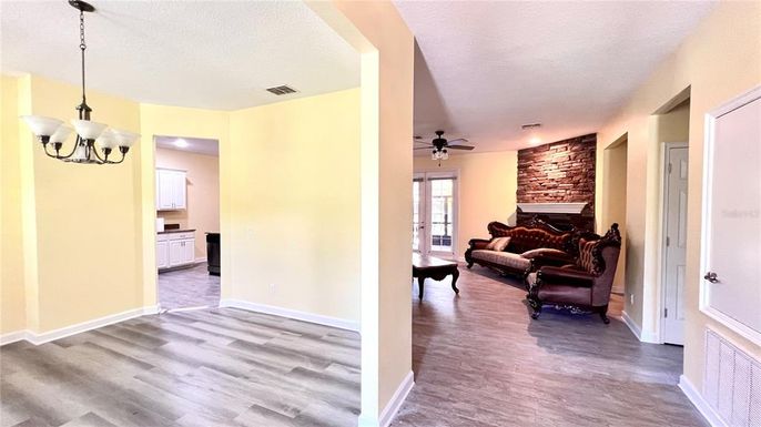 Fireplace, Interior, Living room, Pendant Lights, Stone Walls, Wood Texture Flooring
