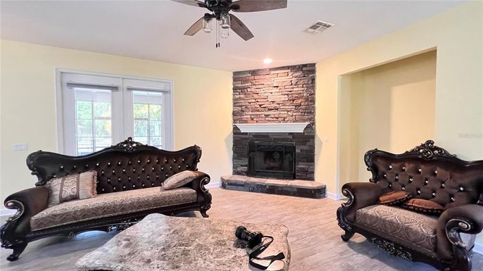 Fireplace, Interior, Recessed Lighting, Stone Walls, Wood Texture Flooring