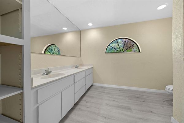 Bathroom, Dual Sink Vanities, Interior, Recessed Lighting, Wood Texture Flooring