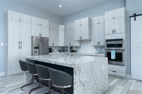 Interior, Kitchen, Recessed Lighting, Stainless Steel Appliances, Wood Texture Flooring
