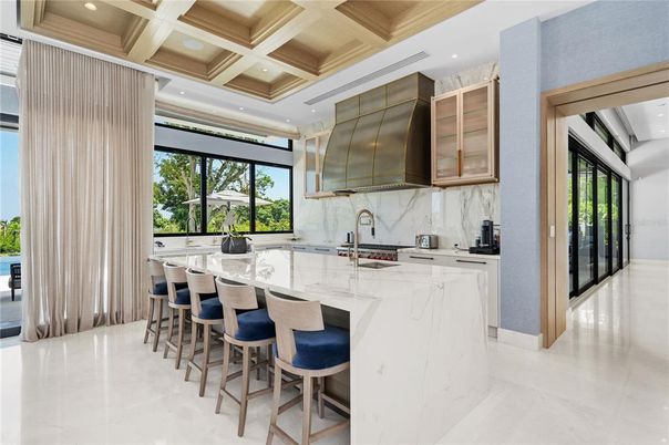 Interior, Kitchen, Marble Walls, Recessed Lighting, Stainless Steel Appliances