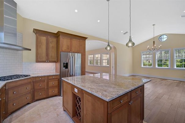 Chandelier, Interior, Kitchen, Pendant Lights, Recessed Lighting, Stainless Steel Appliances, Wood Texture Flooring