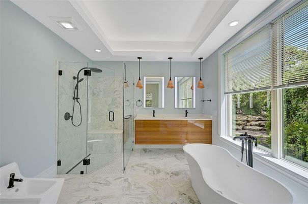 Bathroom, Dual Sink Vanities, Free Standing Baths, Glass Shower, Interior, Marble, Marble Walls, Pendant Lights, Recessed Lighting