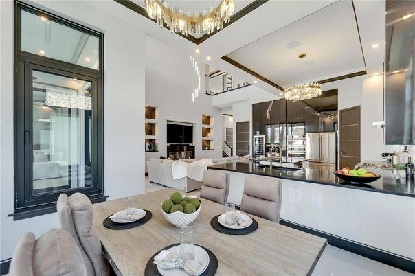 Chandelier, Dining room, Interior, Kitchen, Living room, Pendant Lights, Recessed Lighting, Stainless Steel Appliances