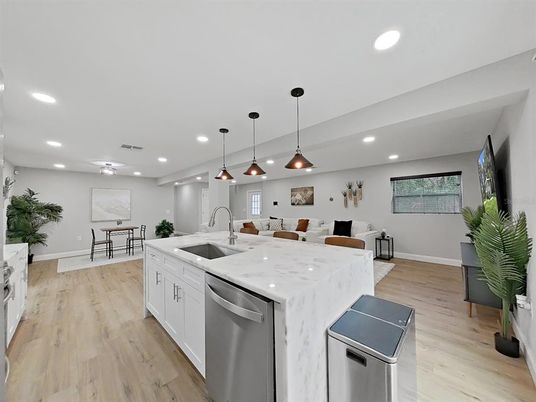 Dining room, Interior, Kitchen, Pendant Lights, Recessed Lighting, Stainless Steel Appliances, Wood Texture Flooring