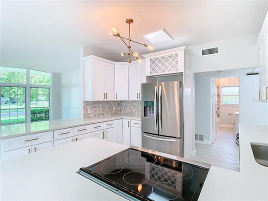 Interior, Kitchen, Pendant Lights, Stainless Steel Appliances, Wood Texture Flooring
