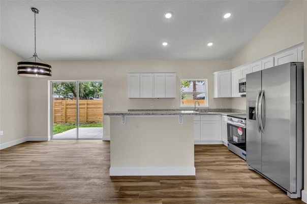 Interior, Kitchen, Pendant Lights, Recessed Lighting, Stainless Steel Appliances, Wood Texture Flooring