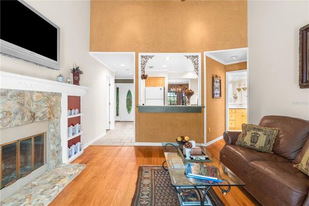 Fireplace, Interior, Kitchen, Living room, Recessed Lighting, Wood Texture Flooring