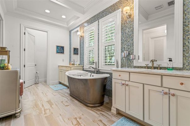 Bathroom, Dual Sink Vanities, Free Standing Baths, Interior, Recessed Lighting, Wood Texture Flooring