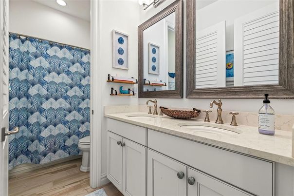 Bathroom, Dual Sink Vanities, Interior, Recessed Lighting, Wood Texture Flooring