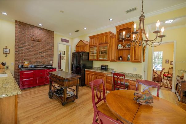 Chandelier, Dining room, Interior, Kitchen, Recessed Lighting, Stone Walls, Wood Texture Flooring