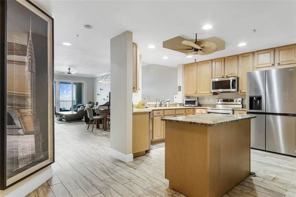 Dining room, Interior, Kitchen, Recessed Lighting, Stainless Steel Appliances, Wood Texture Flooring