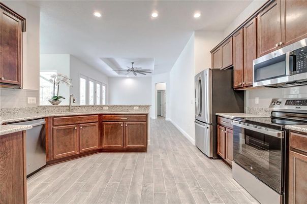 Interior, Kitchen, Recessed Lighting, Stainless Steel Appliances, Wood Texture Flooring