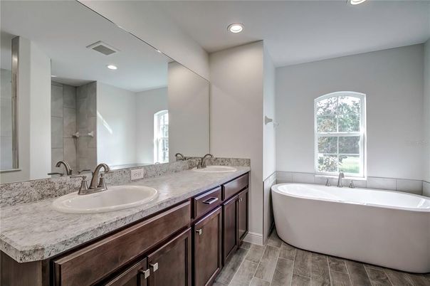 Bathroom, Dual Sink Vanities, Free Standing Baths, Interior, Recessed Lighting, Wood Texture Flooring