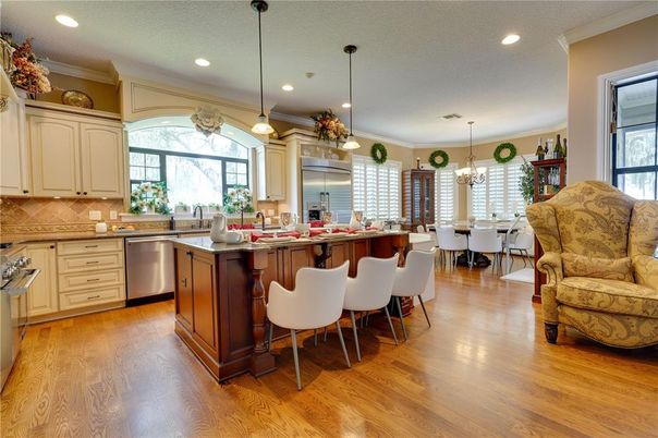 Dining room, Interior, Kitchen, Pendant Lights, Recessed Lighting, Stainless Steel Appliances, Wood Texture Flooring