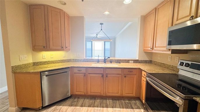 Interior, Kitchen, Pendant Lights, Recessed Lighting, Stainless Steel Appliances, Wood Texture Flooring