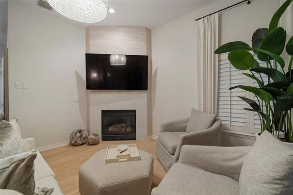 Fireplace, Interior, Living room, Recessed Lighting, Wood Texture Flooring