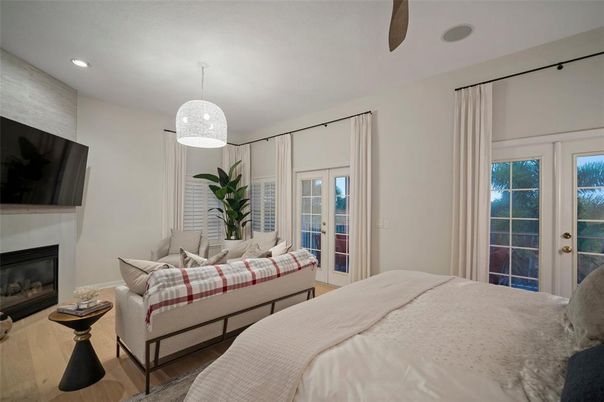 Bedroom, Fireplace, Interior, Pendant Lights, Recessed Lighting, Wood Texture Flooring