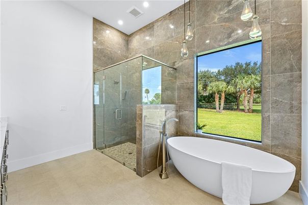Bathroom, Free Standing Baths, Glass Shower, Interior, Pendant Lights, Recessed Lighting