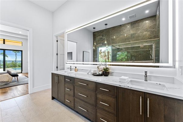 Bathroom, Dual Sink Vanities, Glass Shower, Interior, Recessed Lighting, Wood Texture Flooring