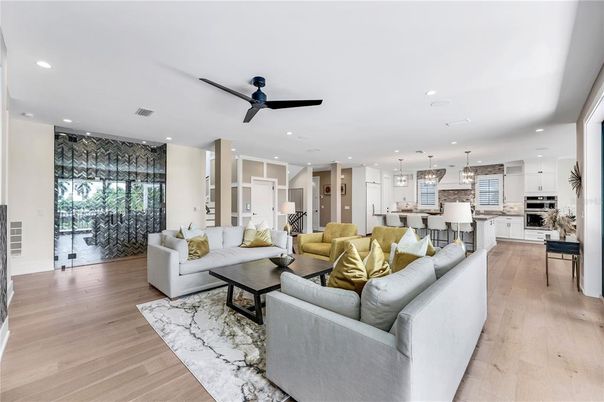 Dining room, Interior, Kitchen, Living room, Pendant Lights, Recessed Lighting, Stainless Steel Appliances, Wood Texture Flooring
